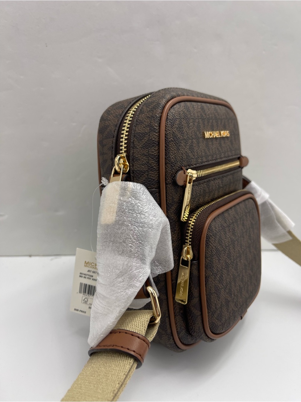 MICHAEL KORS Jet Set Md Flight NS Pocket Signature Logo Crossbody Bag
Brown 
NWT - Picture 13 of 16